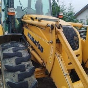 foto Komatsu WB97S 4lopaty traktorbagr rypadlo nakladač