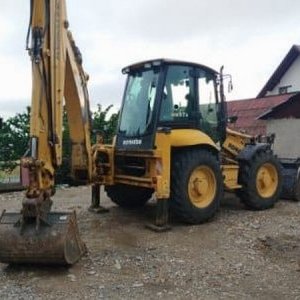 foto Komatsu WB97S 4lopaty traktorbagr rypadlo nakladač