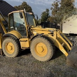 foto Komatsu WB97 S2 s SPZ traktorbagr rypadlo-nakladač