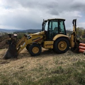 foto Komatsu WB97 s SPZ traktorbagr