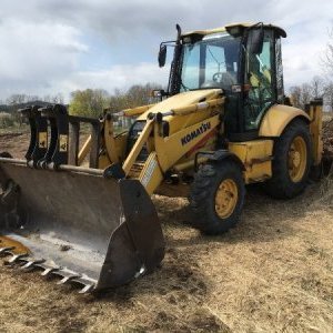 foto Komatsu WB97 s SPZ traktorbagr
