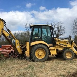 foto Komatsu WB97 s SPZ traktorbagr